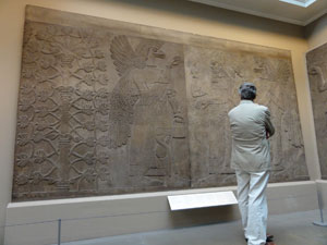 Jim admires a relief in the Assyrian Hall